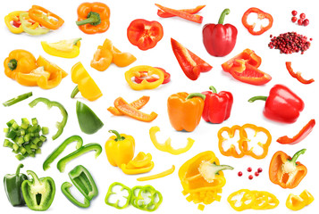 Set of fresh bell peppers and peppercorns on white background