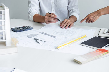 Architecture Engineer Teamwork Meeting, Drawing and working for architectural project and engineering tools on workplace, concept of work on technical drawings