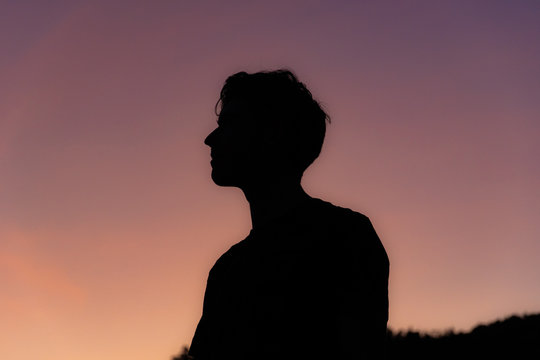 Silhouette of man at sunrise