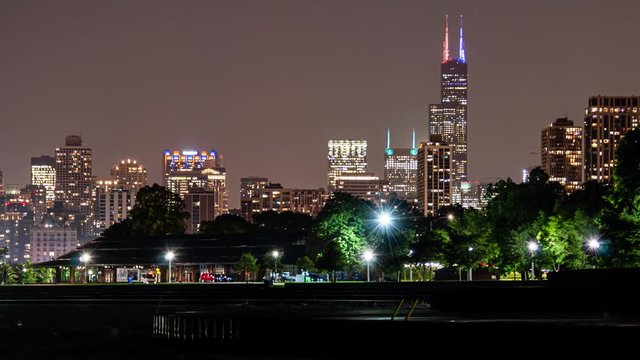 A time lapse of the city lakefront and skyline at night in Chicago, Illinois.