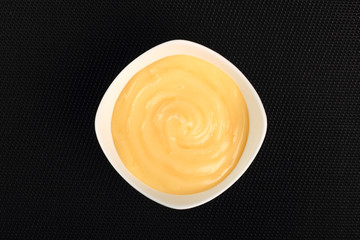 Mayonnaise in bowl. Directly Above.