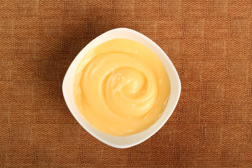 Mayonnaise in bowl. Directly Above.