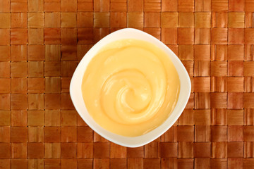 Mayonnaise in bowl. Directly Above.