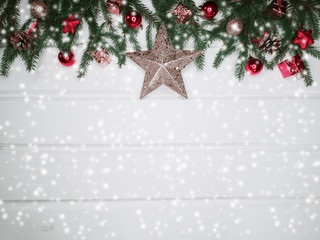 christmas decoration and garland lights on white wooden background