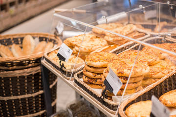 fresh pastries rolls and cheese cakes in the shop window