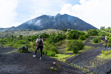 The girls observe the top of the Pacaya volcano in Guatemala.