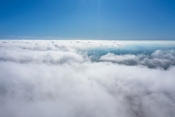 flight over the city and clouds