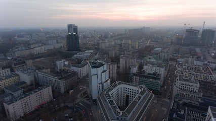 Warsaw Poland. 04. December. 2018.  Panoramic aerial visas on modern skyscrapers and buildings at dusk.
