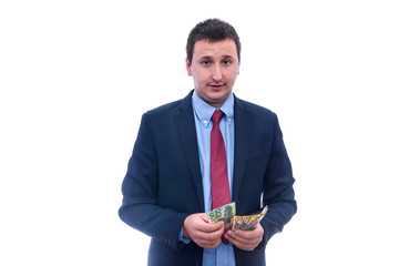 Man in suit counting australian dollar banknotes