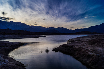 Fototapeta premium Potrerillos dam in the afternoon on spring with some clouds