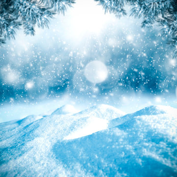 Table background of free space and winter landscape with snowflakes. 