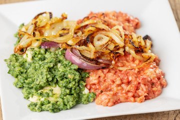 beetroot and spinach spaetzle on a plate