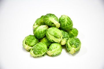 Brussels sprouts 500 grams lies on a white background. Not isolated.