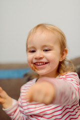Fototapeta premium Portrait of adorable baby girl. Childhood. Authentic image.