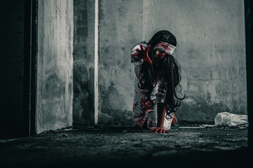 Horror ghost woman crawling with resentment  torture and ask for help, with blood in hand....