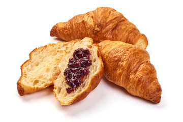 Freshly baked croissants with jam, isolated on white background