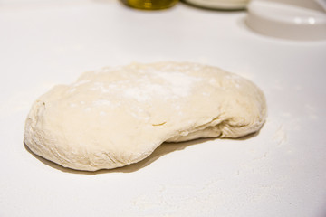 dough with flour on a white background