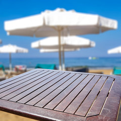 Desk of free space and summer beach 