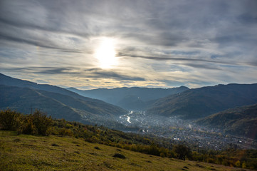 Fototapeta premium Mountains in a blue haze in autumn afternoon