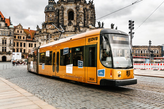 DRESDEN, GERMANY, MARCH 21, 2017: Yellow Dresdner tram in the old town