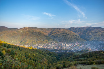 Fototapeta na wymiar Village in the mountains in autumn