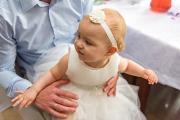 Portrait of adorable baby girl. Childhood. Authentic image.