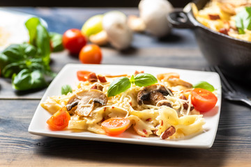casserole  pasta with mushrooms, sausage and cheese