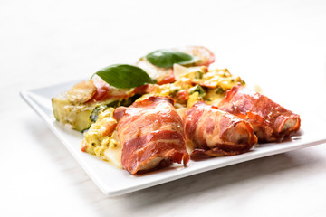 chicken breast fillet baked in bacon