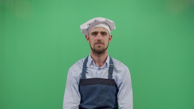 Bad Smeling Hands Expressed By A Adult Man Cook. Studio Isolated Shot Against Green Screen Background