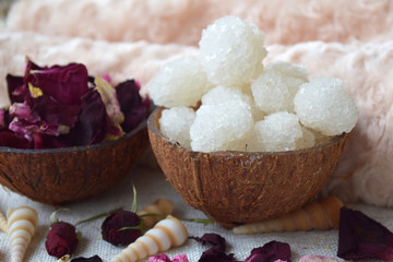 White Dead sea salt in coconut bowl, For alternative medicine, Herbal therapy