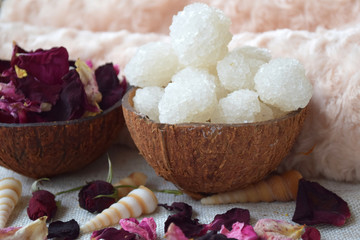 White Dead sea salt in coconut bowl, For alternative medicine, Herbal therapy