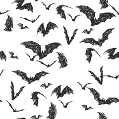 Vector seamless pattern with flock of bats isolated on white. Hand drawn texture with symbol of All Saints Day. Halloween background - obrazy, fototapety, plakaty
