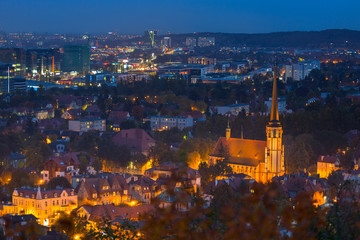 Naklejka premium Cityscape of Gdansk Oliwa at night, Poland