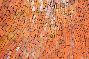 empty wall of bright orange mosaic for your design