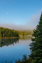 Fototapeta na wymiar Moon and Mist on Brewer Lake