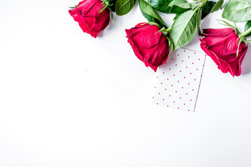 concept Valentine's Day with flower white background top view