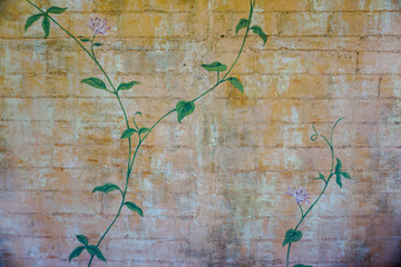 Hand painted flowers design on a wall