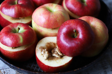 Apples before baking. Baked apples with cinnamon and honey. Selective focus. Macro.