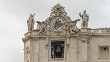 Fototapeta na wymiar Bells ring in the San Pietro Papal Basilica belfry in Vatican during Pope preach