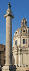 Fototapeta na wymiar Trajan's Column (Colonna Traiana) Roman triumphal column that commemorates Roman emperor Trajan's victory in the Dacian Wars