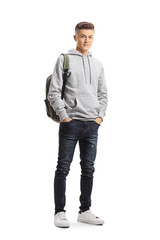 Teenage schoolboy posing with hands in pockets