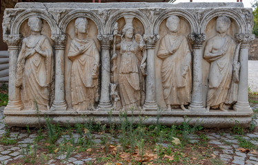 Aphrodisias (Afrodisias) Ancient City in Caria, Karacasu, Aydin, Turkey. Ancient gods relief on tomb. Aphrodisias was named after Aphrodite, the Greek goddess of love.