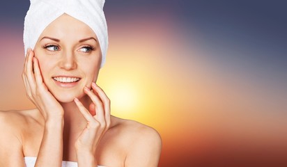 Young beautiful healthy woman with white towel