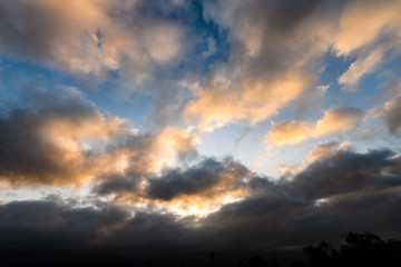 Cumulus Clouds Glow Orange at Sunrise 1