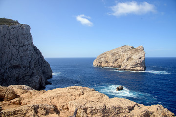 Fototapeta na wymiar view of single rock in sea