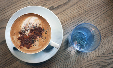 Cappuchino with some goodies on top (cinnamon, cardamom)