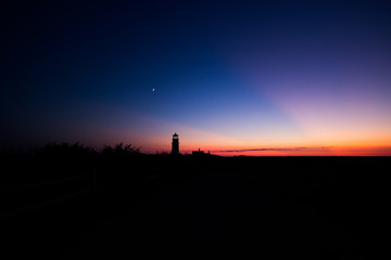 Silhouette of a Lighthouse in the sunset of Cape Cod