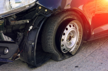 Accident on the road with damage to the car. knocked wheel.