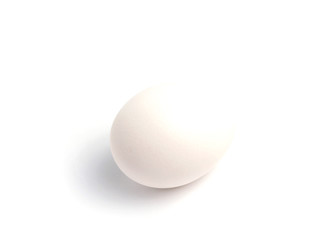 White egg on a white background isolate