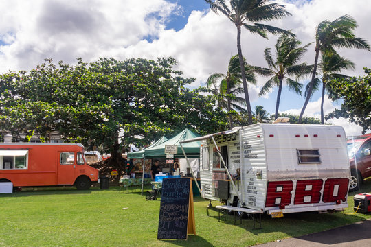 On September 28, 2019, Food Trucks Offer Meals At The Maui Swap Meet In The City Of Kahului, Hawaii.